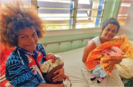 ?? Photo: Sampras Anand ?? Mothers, Adi Losavati and Ashmita Sharma, with their newborn babies at the Labasa Hospital on December 25, 2022.