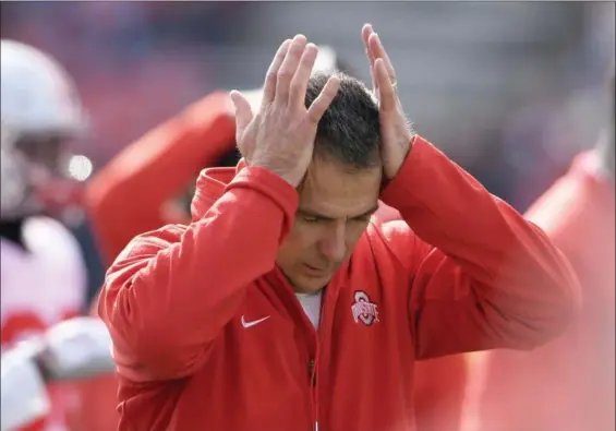  ?? NICK WASS — ASSOCIATED PRESS ?? Ohio State coach Urban Meyer has a look of disbelief during one of his team’s games this year. The Buckeyes have had a topsy-turvy season, but are 10-1 with all their goals still ahead of them heading into the Michigan game on Nov. 24.