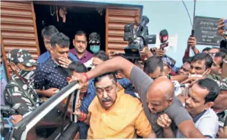  ?? ?? TRINAMOOL CONGRESS leader Anubrata Mandal after his arrest by the CBI in connection with a cattle smuggling case, at Bolpur in Birbhum, on August 11. His arrest has hit the party at the organisati­onal level.