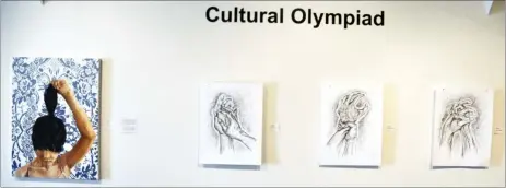  ?? Photo by Matthew Liebenberg ?? An oil painting by Rui Chen (at left) of Regina and three pen and ink drawings of hands by Jemmie Ponting of Swift Current in the exhibition Cultural Olympiad.