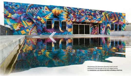  ?? L.E. BASKOW/LAS VEGAS REVIEW-JOURNAL PHOTOS ?? Marketing CEO Brandon Bowsky had a mural painted on the facade of his Las Vegas home.