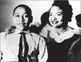  ??  ?? EMMETT TILL with his mother, Mamie Till Mobley, in a family photo. Emmett, 14, was visiting relatives in Money, Miss., in 1955 when he was abducted and killed.