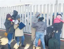  ?? Photo / AP ?? Migrants who make it to the Mexican-US border in Tijuana are finding it harder to enter the United States.