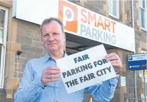  ??  ?? Perth MP Pete Wishart has compared Smart Parking, operators of the Kinnoull Street car park, to John Wayne. Picture: Angus Findlay.