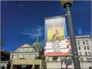  ?? KAITLYN FOTI — DIGITAL FIRST MEDIA ?? New banners are unveiled Tuesday at the Montgomery County Courthouse for each of the men who died serving in the military.