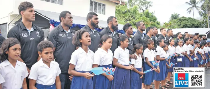  ?? Photo:Ronald Kumar. ?? Fiji Airways Flying Fijians singing the national anthem with the students during their visit to St. Anne’s Primary School on June 13, 2018.