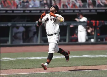  ?? NHAT V. MEYER — BAY AREA NEWS GROUP, FILE ?? The Giants’ Brandon Crawford celebrates his two-run home run against the Padres at Oracle Park on Sept. 27.