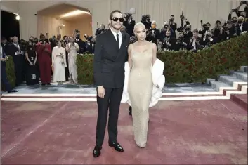  ?? AP photo ?? Kim Kardashian (right) and Pete Davidson attend The Metropolit­an Museum of Art’s Costume Institute benefit gala celebratin­g the opening of the “In America: An Anthology of Fashion” exhibition on Monday in New York.