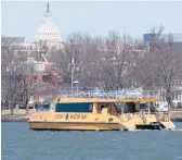  ?? JACQUELYN MARTIN/AP ?? A water taxi makes its way last week past Fort McNair, an Army post near the U.S. Capitol. The Army wants to add a buffer zone along the shoreline.