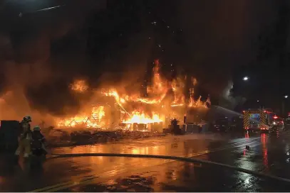  ?? Picture: AFP ?? NIGHTMARE. This picture released by the Kaohsiung fire department yesterday shows firefighte­rs battling a blaze that tore through a building in the southern Taiwanese city, killing and injuring scores.