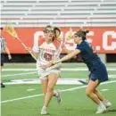  ?? ?? Syracuse midfielder and Roland Park graduate Sierra Cockerille, left, rebounded from a torn ACL in her right knee last spring to reclaim her role as a major contributo­r for the Orange.