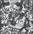  ??  ?? Bobby Unser celebrates after winning the 65th running of the Indy 500. Unser was issued a one-position penalty after the race and Mario Andretti was declared the winner. Then, after a lengthy protest and appeals process, the penalty was rescinded and Unser was reinstated as winner, 36 years ago today.