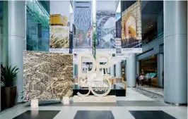  ??  ?? BIG &amp; BOLD An exhibition was held to mark DP Architects’ 50th anniversar­y in 2017; The Dubai Mall is one of the largest shopping complexes in the world