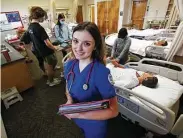  ?? Gary Kazanjian / Associated Press ?? First-year nursing student Emma Champlin said she saw the pandemic as a chance to help at a critical time.