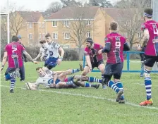  ?? ?? Allen Carr touches down for Lions at Kettering. Photo: Mick Sutterby.