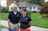  ??  ?? State Rep. Tom Quigley, R-146th Dist., with Annie Bonenberge­r stand in front of their informatio­n table during National Night Out in Royersford.