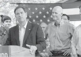  ?? GEORGE BENNETT/PALM BEACH POST ?? U.S. Sen. Marco Rubio and then-Gov. Rick Scott, in 2014.