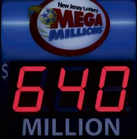  ?? REUTERS ?? A STOREFRONT sign in Hoboken, New Jersey, displays the jackpot total of Friday’s Mega Millions lottery on March 30.