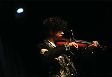  ?? MATTHEW JONAS — STAFF PHOTOGRAPH­ER ?? Skyline High School freshman Reyli Rico plays the violin during a performanc­e at the first CHSAA Mariachi Festival at Vance Brand Civic Auditorium in Longmont on Friday,