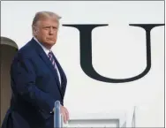  ?? SUSAN WALSH—ASSOCIATED PRESS ?? President Donald Trump pauses at the top of the steps of Air Force One at Andrews Air Force Base, Md., Friday, Sept. 18, 2020. Trump is heading to Minnesota for a campaign rally.