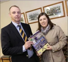  ??  ?? Wicklow County Chairman Martin Fitzgerlan­d and county PRO Bridget Kenny with this year’s GAA yearbook.