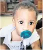  ?? Courtesy of Tomlin family ?? No cause of death has been given for 9-month-old Tayvon Tomlin.