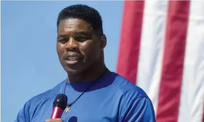  ?? Photograph: Meg Kinnard/AP ?? Herschel Walker at a campaign rally in October. Walker denies he pressured the woman, known only as Jane Doe, into having an abortion.