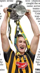  ??  ?? TRIUMPH: Kilkenny’s Joey Holden raises Liam in 2015