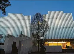  ??  ?? Above: Visitors move through Carlos Cruz-Diez’s “Cromosatur­ación MFAH,” a tunnel to the Kinder Building.
Left: The Cullen Sculpture Garden opens up toward the new building’s west facade.