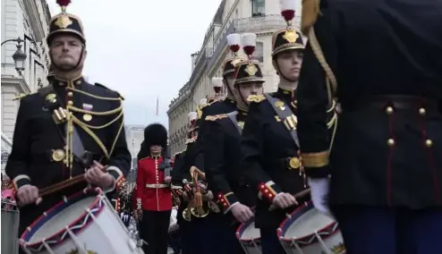  ?? ?? British soldiers and Republican Guards arrive at the Elysee Palace, Monday, April 8, 2024