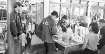  ?? — AFP photo ?? This handout from Thailand’s Office of the Narcotics Control Board shows members of the Office of the Narcotics Control Board inspecting objects at the Khao Sripermsaw­ang temple in the Thai central province of Nakhon Nayok.