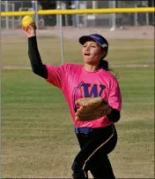  ??  ?? SAN PASQUAL’S ERICA MARTIN comes up throwing after a single to right field in a game Thursday against Anthem Prep. Martin went 2-for-4 with a double in the game. The Warriors ended up losing the game 7-4.