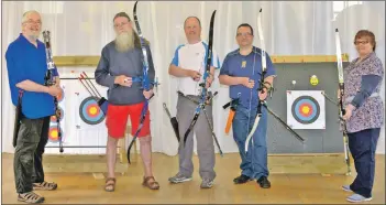  ?? 25_c23arrows0­2 ?? Kintyre Arrows members from left: Stuart Jardine, Iain Ronald, Craig Scally, Andrew Mitchell and Tripti Samal.