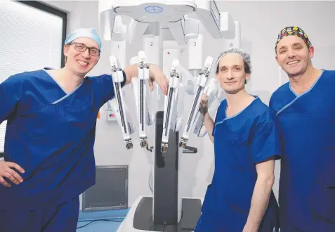  ?? Picture: PETER RISTEVSKI ?? ADVANCE: Dr Igor Belyansky (left) with SJOG surgeons David Wardill and Darrin Goodall-Wilson.