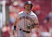  ?? AARON DOSTER — THE ASSOCIATED PRESS ?? The San Francisco Giants’ Evan Longoria runs the bases after hitting a three-run home run during the eighth inning Sunday against the Cincinnati Reds in Cincinnati.