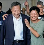  ?? AP ?? FIGHTING TOGETHER: Occupy Central leader Benny Tai is accompanie­d by pro-democracy lawmaker Helena Wong, as he leaves the High Court in Hong Kong on Thursday. —