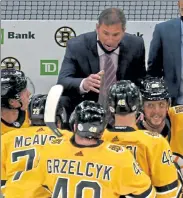  ?? STUART CAHILL / BOSTON HERALD FILE ?? Bruins coach Bruce Cassidy talks to his team during a timeout in the final seconds against the Sabres at the Garden on Saturday.