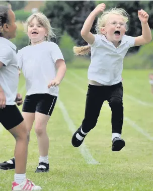  ?? PICTURES: STEVE PORTER
AN143973 ?? One young competitor at Ash Grange Primary School sports day could not contain her delight.