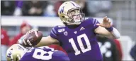  ?? Stephen Brashear / Associated Press ?? Washington quarterbac­k Jacob Eason throws a pass during the first half against Washington State in Seattle on Nov. 29.