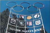  ?? HAVEN DALEY — THE ASSOCIATED PRESS ?? The Olympic rings stand atop a sign at the entrance to the Squaw Valley Ski Resort in Olympic Valley on July 8, 2020.