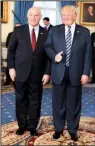  ?? AP/ALEX BRANDON ?? Secret Service Director Joseph Clancy stands with President Donald Trump during a reception for inaugural law enforcemen­t officers and first responders in the Blue Room of the White House on Sunday in Washington.