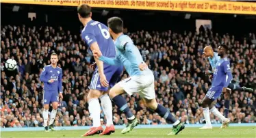  ?? | Reuters ?? MANCHESTER City captain Vincent Kompany scores against Leicester City at the Etihad Stadium on Monday night.