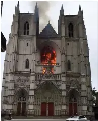  ??  ?? IN FLAMES: The blaze at Nantes cathedral yesterday