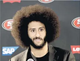  ?? Rick Scuteri Associated Press ?? GQ HONORED Colin Kaepernick for his activism last season, when the former NFL quarterbac­k knelt during the national anthem to protest racial injustice.