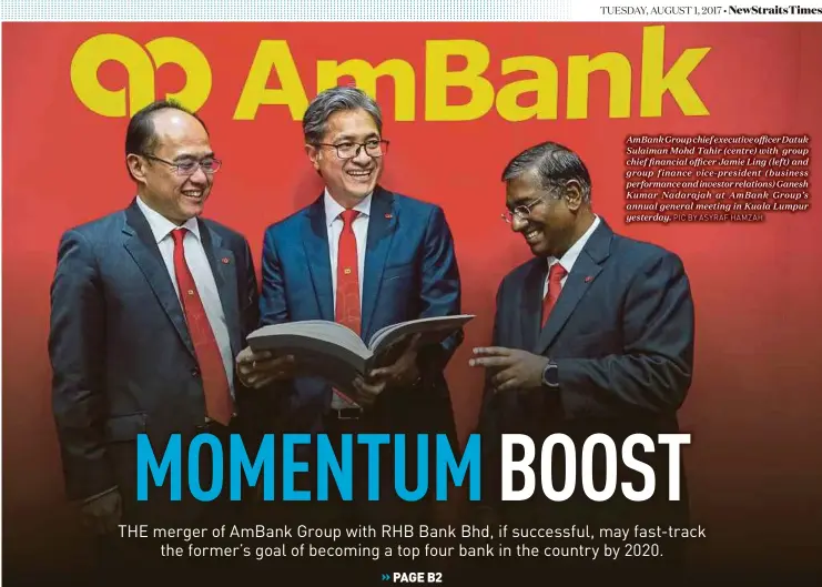  ?? PIC BY ASYRAF HAMZAH ?? AmBank Group chief executive officer Datuk Sulaiman Mohd Tahir (centre) with group chief financial officer Jamie Ling (left) and group finance vice-president (business performanc­e and investor relations) Ganesh Kumar Nadarajah at AmBank Group’s annual...