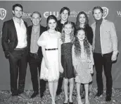  ?? KEVORK DJANSEZIAN/GETTY ?? Ben Lawson, from left, Richard Thomas, Marcelle LeBlanc, Christian Finlayson, Tatum Matthews, Callaway Corrick, Bellamy Young and Logan Shroyer, seen Nov. 13, are cast in “The Waltons: Homecoming.”