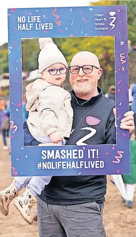  ?? ?? Daredevil Kenny Hunt with his one-year-old granddaugh­ter Isla