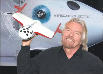  ?? — Virgin Galactic photos ?? Branson said, “It was as good as it gets today.”