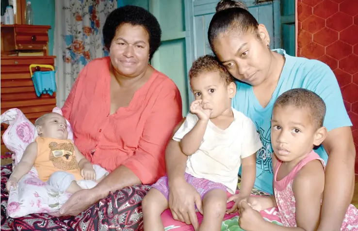  ?? Photo: Waisea Nasokia ?? Sanaila Ruitoka’s family from left: Daughter Kasanita (four-months-old), his aunt Ivanai Mocemusu, Liku, 2, wife Vilimaina Tabu and Tuvou, 3, at their home in Yavusania, Nadi, on August 4, 2018.