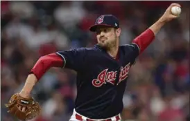  ?? DAVID DERMER — ASSOCIATED PRESS ?? Andrew Miller delivers during the seventh inning.